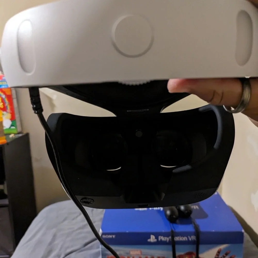 hardly used VR with the two controllers and all the cords with Spider-Man VR